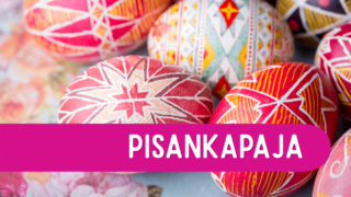 Kuvassa teksti: "Pisankapaja", taustalla pinkin ja punaisen sävyisiä pisankamunia